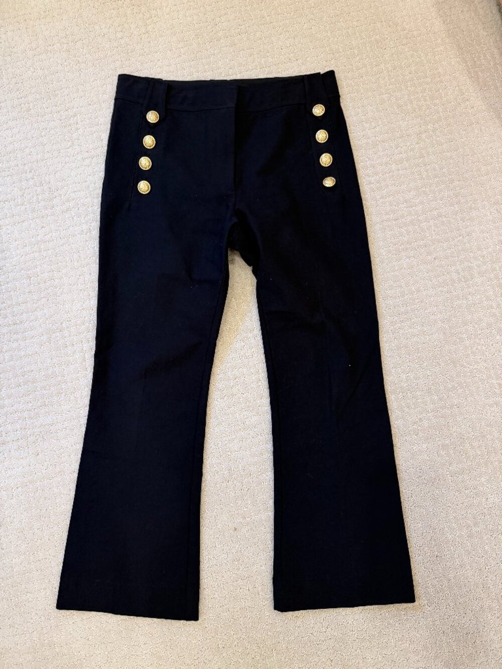 Black high-waisted sailor-style flare pants with stunning gold button accents ✨